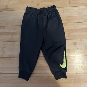 Nike Kids Black Joggers with Neon Swoosh